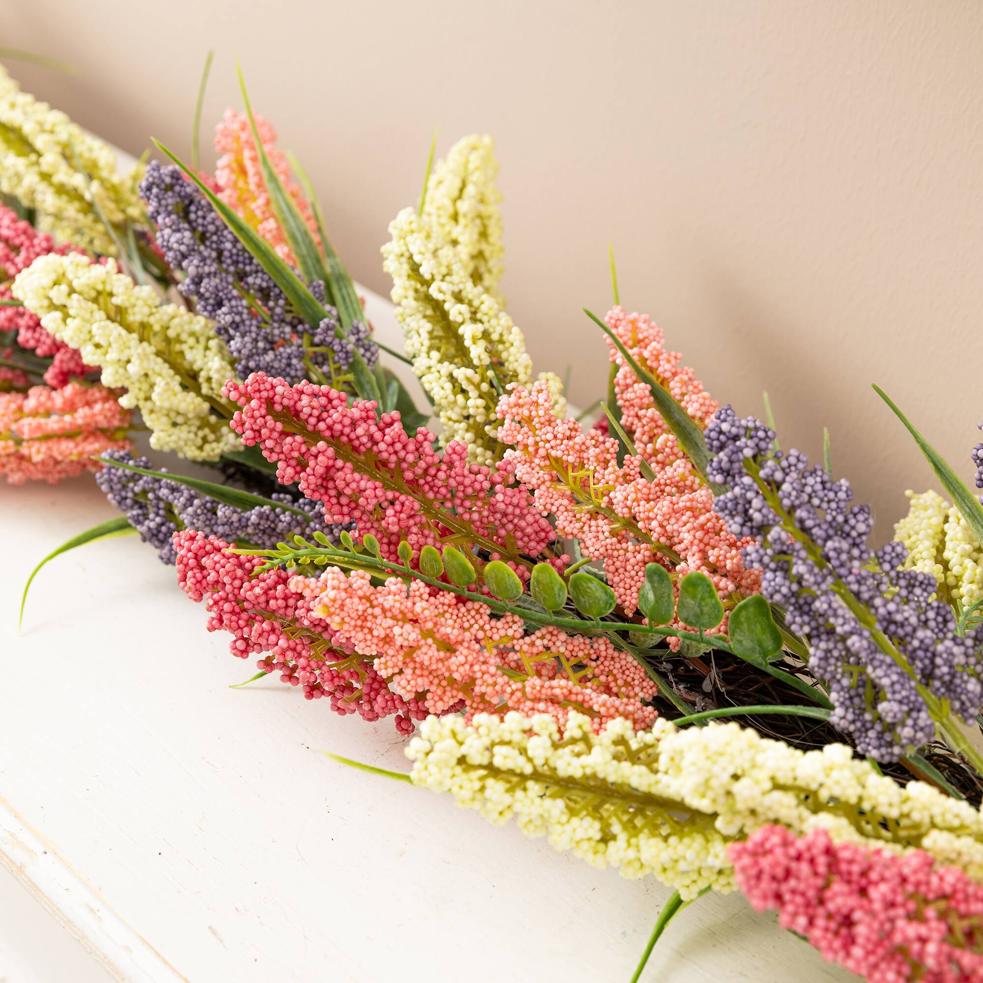 Glitzhome® 6ft. Pink, Purple & Yellow Mixed Heather Garland